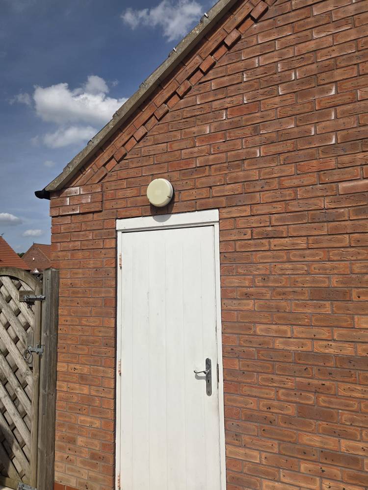 Property maintenance on brick outbuilding